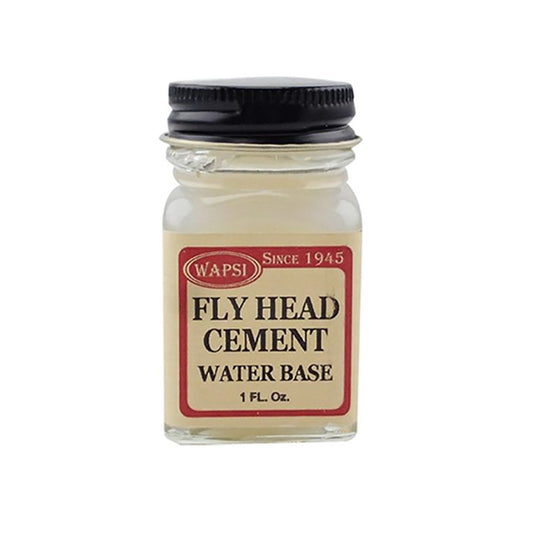 The product, Wapsi Fly Head Cement with a Water Base is shown in a 1 ounce glass bottle on a white background