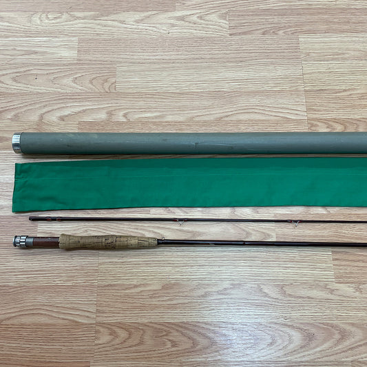 Shown are the butt, reel seat, grip and ferrule of the St. Croix Imperial 906 two piece fly rod with an aluminum case and green rod sack.